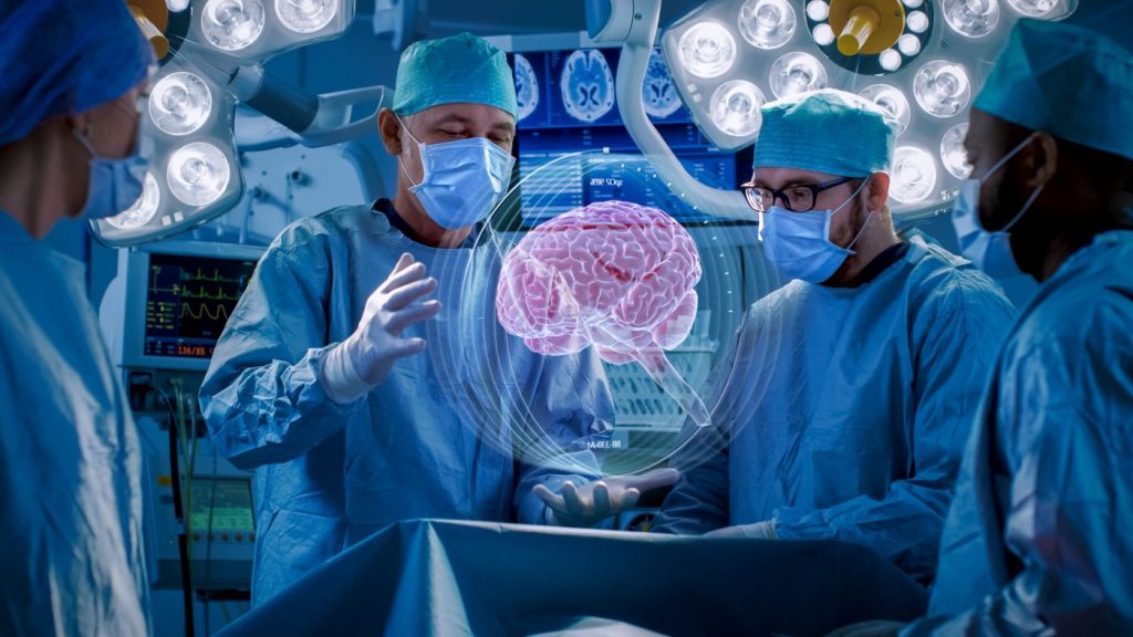 Doctors gathered around a projected image of a brain, showing the use of AI in healthcare.