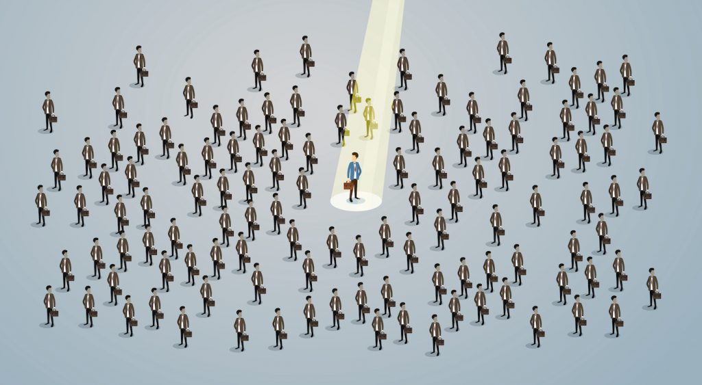 Illustration of a spotlight on one job-seeker in a crowd of many job-seekers. Represents creative ways to find employees.