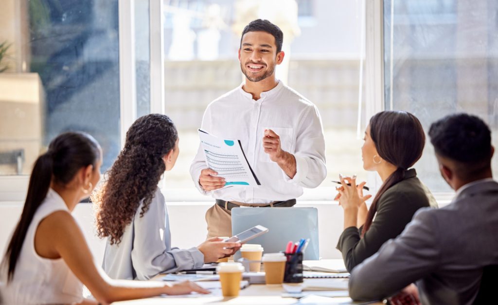 Picture of a manager training his employees.