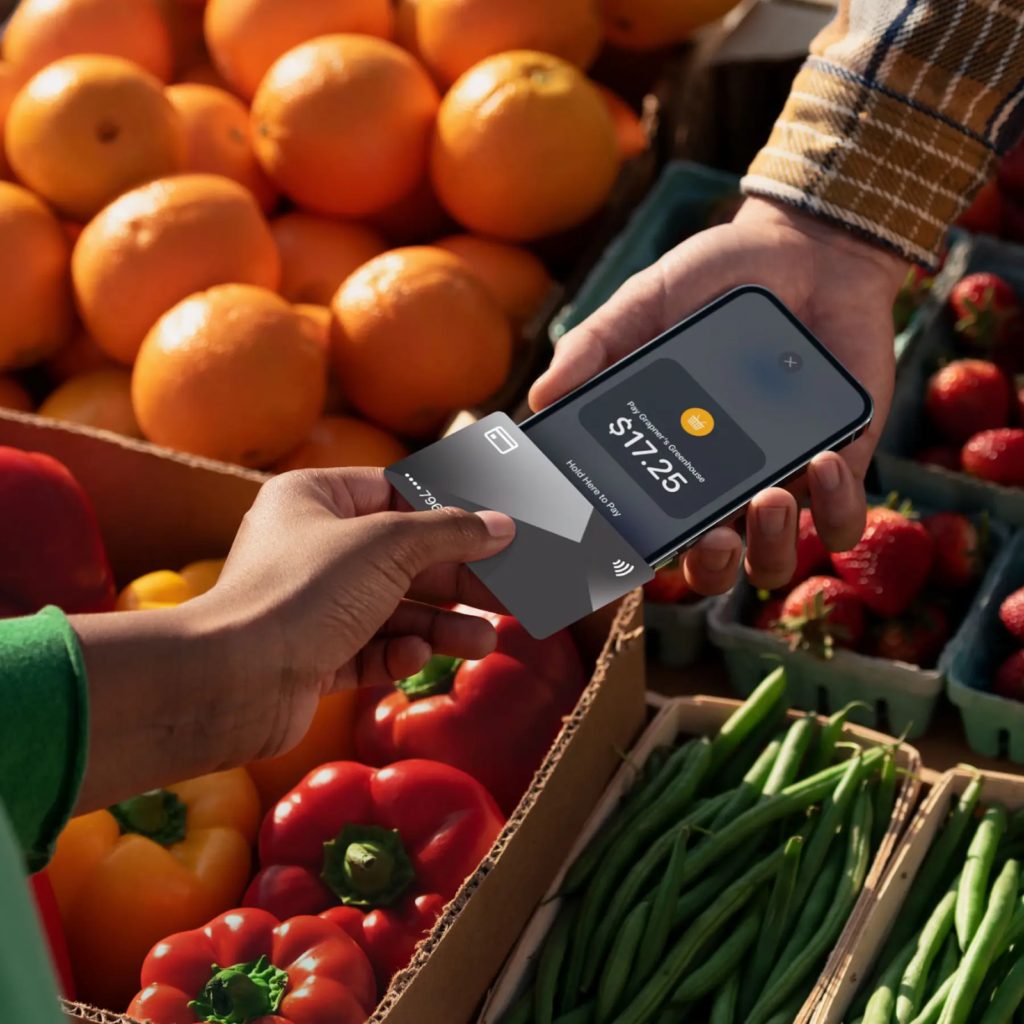 PayPal Zettle's tap to pay POS app being used at at fruit stand.