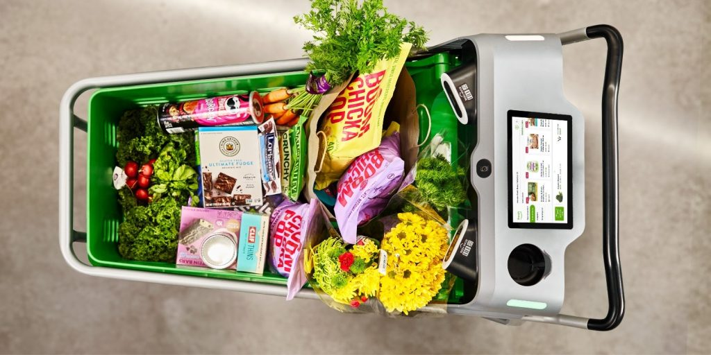 Amazon Dash Cart with sample merchandise inside the basket.