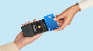 Square tap to pay functionality with person tapping card to phone on blue background