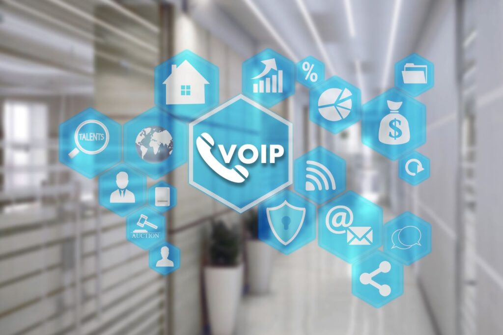 Hexagonal figure containing VoIP text surrounded by icons representing VoIP communication features.