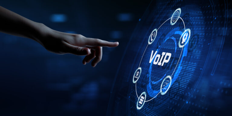 A hand pointing to VoIP