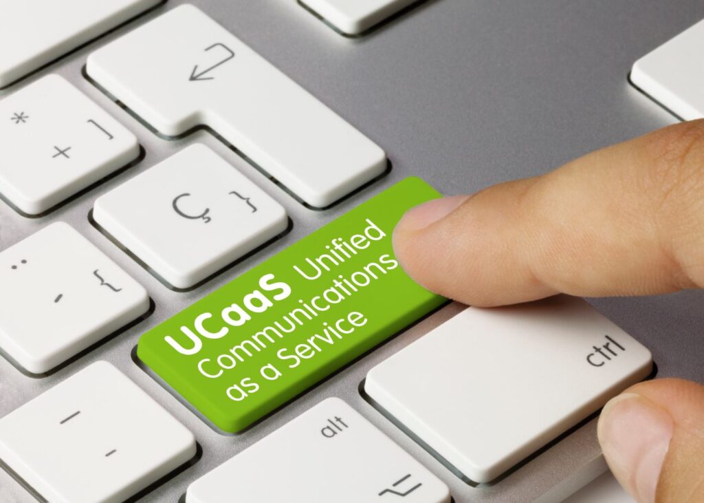 UCaaS green button on a keyboard.