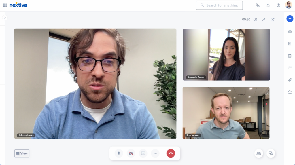 The Nextiva video conferencing interface with three participants engaged in a conversation.