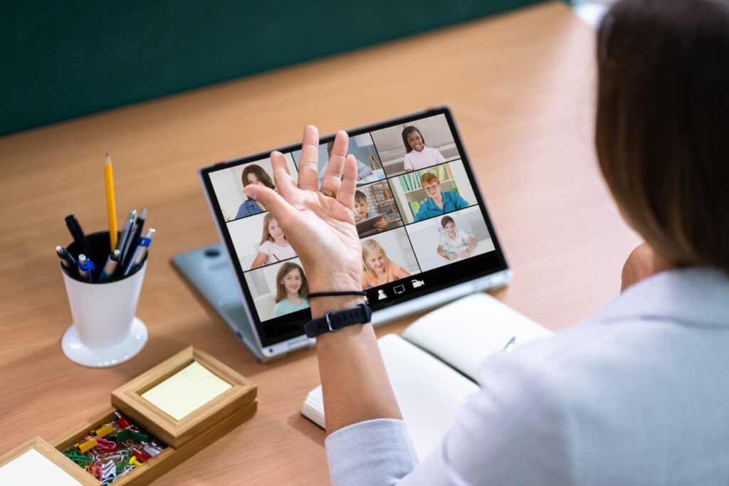 Teacher hosting online class using video conference.
