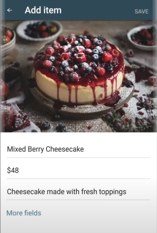 WhatsApp Business product listing screen showing a mixed berry cheesecake with price and item description.