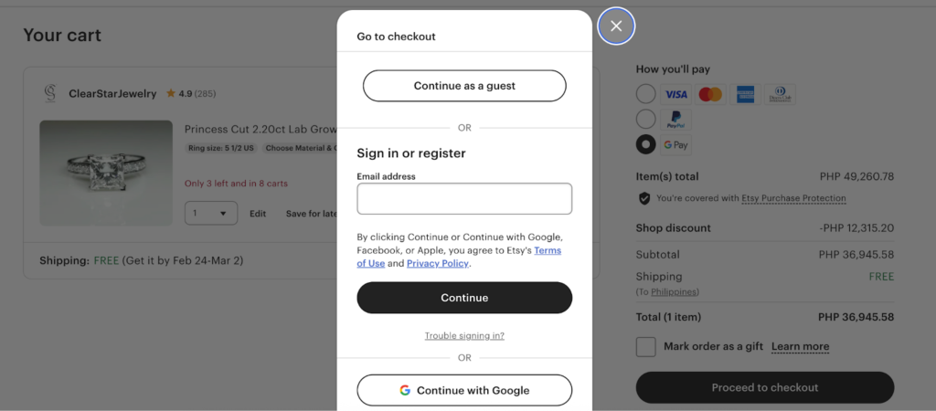 Checkout modal showing a prominent “Continue as a guest” button above sign-in and registration options on Etsy’s checkout page.