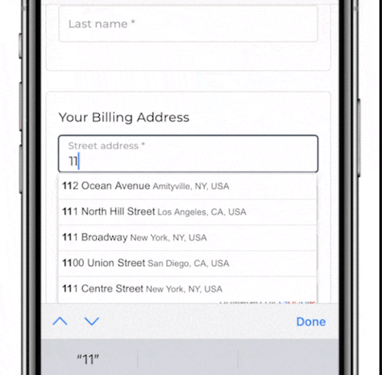 Checkout form showing an auto-completing billing address field with suggested addresses and prefilled city, state, and country fields.