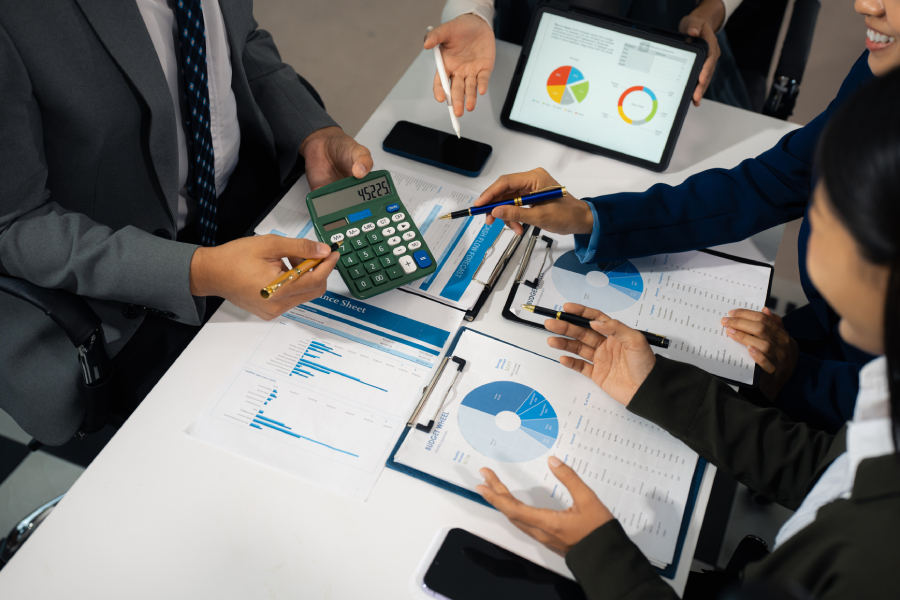 Business team discussing financial reports.