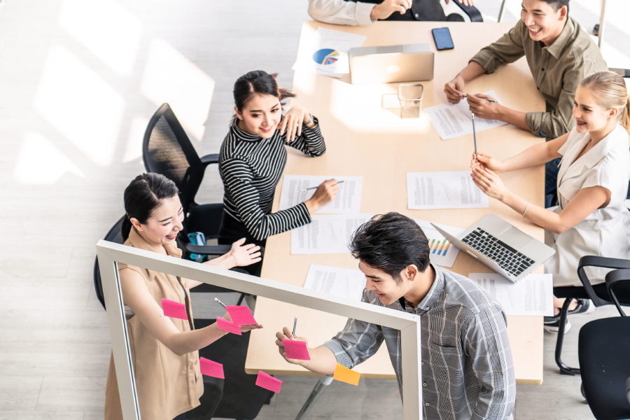A team brainstorming to solve problem.