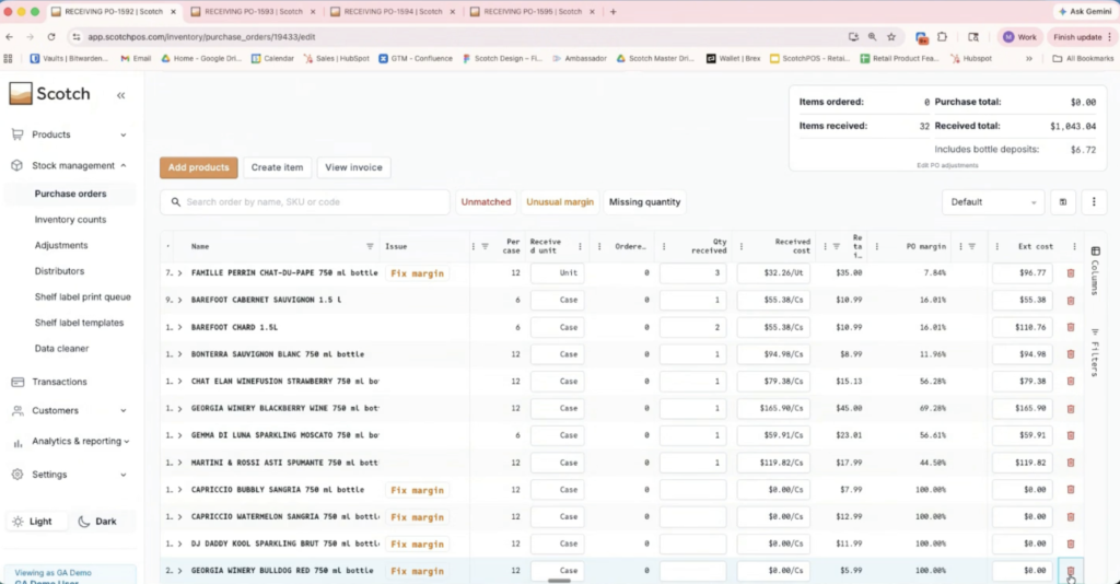 Scotch inventory receiving dashboard showing received products, unusual margin alerts, quantity discrepancies, and purchase order details during invoice processing.