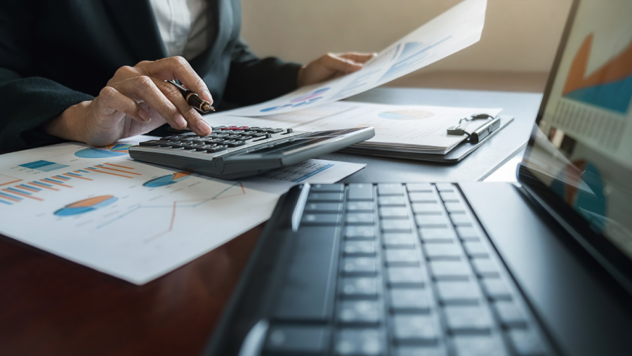 A man analyzing accounting reports.
