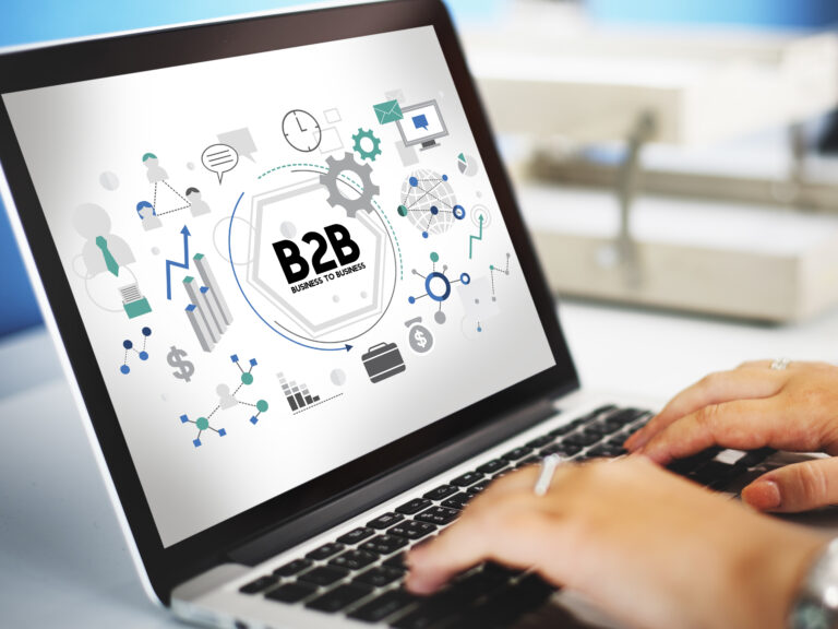 B2B marketing dashboard displayed on a laptop screen illustrating the workflow of top AI lead generation tools for business growth.